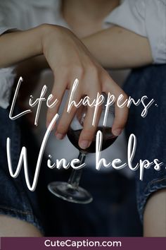 a woman holding a wine glass with the words life happens wine helps