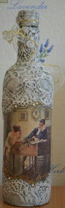 an old fashioned glass bottle with a painting on it