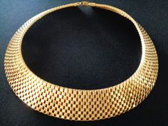 Rare Vintage Demas DL Auld Yellow Gold Plated Metal Basket Weave Mesh Designs Collar Necklace Cleopatra Style Jewelry Simply Elegant Timeless Iconic Piece That Never Goes Out of Style! This lovely piece is signed A with wings on the clasp. Measures approx: 17 inches and 1 inch wide. This lovely necklace is in Excellent vintage condition beautiful clean shiny and ready to wear! For more brand names of vintage jewelry and accessories please see our "High End Vintage Jewelry" Shop Section: https:// Cleopatra Jewelry, Cleopatra Style, Metal Basket, Bridal Jewelry Collection, Metal Baskets, Gold Choker Necklace, Gold Choker, Lovely Necklace, Basket Weave