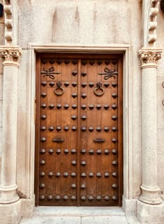 a large wooden door with ornate carvings on it