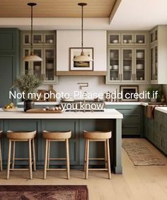 an image of a kitchen setting with green cabinets and stools on the countertop