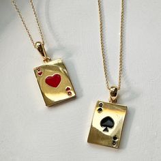 Get them solo or get the set! The set includes a playful pair of queen suited pendants, one for you and one for your bestie. The queen of hearts (♥) and queen of spades (♠) are neatly detailed in enamel. Pendants measure 15mm x 11mm. Chain is adjustable between 14" and 17.5". This is our grownup take on the classic friendship charm necklace and part of our BFF Charm Collection; tiny charms thoughtfully designed for you and your bestie. Each necklace in the two piece set is strung with a charm ha Queen Of Hearts Necklace, Queen Of Hearts Jewelry, Cards Necklace, Best Friends Necklace, Tiny Charms, Enamel Pendants, Sun And Moon Necklace, The Queen Of Hearts, Playing Cards Design