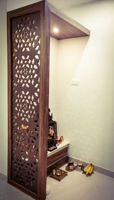 a room divider made out of wood with an intricate design on the top and bottom