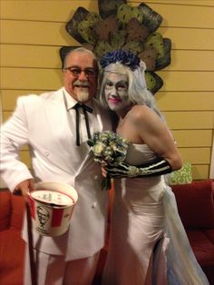 a man and woman dressed up as the bride and groom pose for a photo together