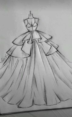 a drawing of a dress is shown on a piece of paper