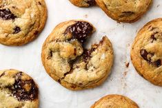 chocolate chip cookies on a baking sheet ready to be eaten