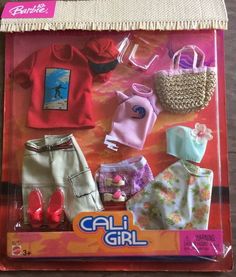 a barbie doll with clothes and accessories in its box