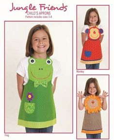 two girls wearing aprons, one with a frog on it and the other with a lion