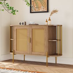 a wooden cabinet with two doors and some plants on the top shelf next to it