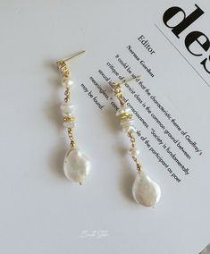 These earrings feature genuine freshwater baroque pearls delicately connected with small, varied shapes of Keshi pearls, creating an enchanting asymmetrical design and graceful lines.  P E A R L ∙ E A R R I N G S ✨Total Length : about 5.5 cm ✨Color: natural untreated, metallic white with tint of pink overtone(The color of this sheen may vary） ✨Material: Ear studs are gold plated S925 sterling silver, suitable for sensitive skin.  It is nickel free, hypoallergenic, tarnish resistant O T H E R ∙ I Freshwater Pearl Earrings Diy, Delicate Baroque Pearl White Earrings, Delicate Baroque Pearl Earrings With Pearl Charm, Minimalist Baroque Pearl Earrings With Pearl Chain, Dainty Baroque Pearl Earrings With Pearl Chain, Dainty Baroque Pearl Chain Earrings, Dangle Earrings With Baroque Pearl Chain, Baroque Pearl Drop Dangle Earrings, Baroque Pearl Drop Earrings In White