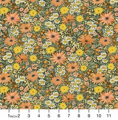 an orange and yellow flowered background with green leaves, flowers, and white daisies