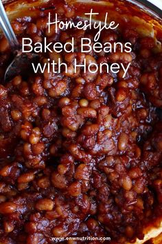 homemade baked beans with honey in a pot on the stove and text overlay reads, home style baked beans with honey