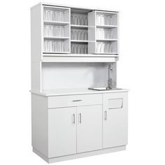 a white kitchen cabinet with two doors and cupboards on the front, one door open to reveal a sink