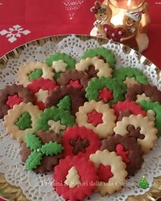 a plate full of christmas cookies on a table