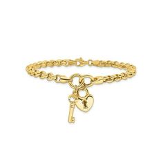 a gold bracelet with a heart and key