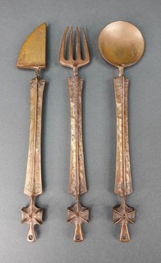 three forks, two spoons and one knife