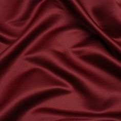 a close up view of a red fabric