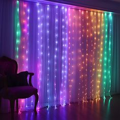 a chair sitting next to a window covered in lights