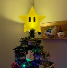 a christmas tree decorated with lights and decorations