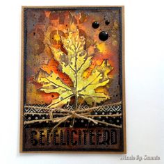 a card with an autumn leaf on it