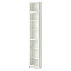 a tall white bookcase with three shelves