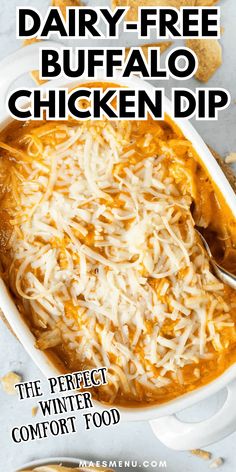 dairy - free buffalo chicken dip in a white casserole dish with text overlay