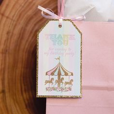 a pink gift bag with a thank you for coming to my birthday party tag