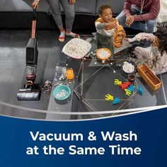 a group of people sitting around a glass table with food on it and the words vacuum & wash at the same time