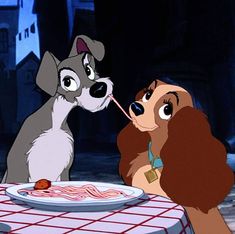 lady and the tramp sitting at a dinner table