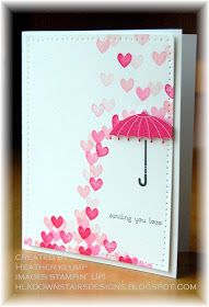 a card with hearts on it and an umbrella in the middle is featured for valentine's day