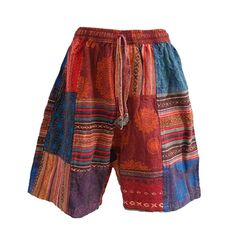 Unisex handsewn patchwork shorts made in Nepal. These high quality shorts are thicker and more durable than your standard cotton shorts. Features:  - As these are handmade the locations of the patches may vary. However, the general colour will remain the same. - Elastic waist with a draw string - 2 side pockets - 1 back pocket Sizes:  *As these are handmade these dimensions may vary slightly M: *        Elastic waist: 68-106cm *        Outseam: 51cm *        Inseam: 21cm L: *        Elastic wais Cheap Patchwork Shorts, Cheap Patchwork Short Bottoms, Hippie Shorts, Boho Yoga, Patchwork Shorts, Hippie Bohemian, Minimalist Outfit, Cotton Shorts, Short Outfits