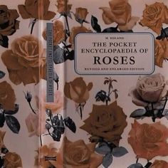 the pocket encyclopaedia of roses is shown in front of a white background