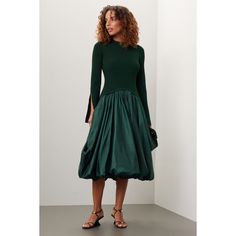 Green knit (83% Rayon, 17% Elastane; Combo: 70% Polyester, 30% Nylon). Lining (100% Nylon). A-line. Long sleeves. Crewneck. Pull on. 51.5" from shoulder to hemline. Imported. Balloon Skirt, Rent The Runway, Closet Designs, Drop Waist, Midi Skirt, A Line, Cocktail Dress, Midi Dress, Long Sleeves