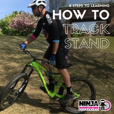 a man riding a bike with the words how to track stand on it