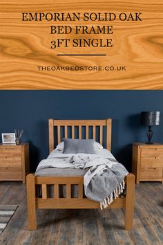 a wooden bed frame in a bedroom with blue walls and wood flooring that says, victorian solid oak bed frame 3ft single