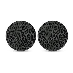 pair of black and white leopard print ear plugs with an animal print pattern on the side