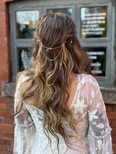 the back of a woman's head with long hair