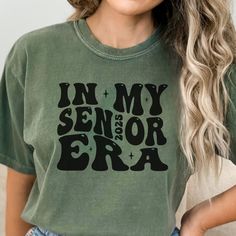 In My Senior Era Comfort Colors Shirt is the perfect gift for any senior graduating with the class of 2025! This shirt runs true to size.  If you want an oversized look, please order one size up.  If you want the oversized dress look, please size up two sizes. Short Sleeve: This is made with a 1717 Comfort Colors, garment-dyed t-shirt. Made with 100% ring-spun cotton, soft-washed, and garment-dyed fabric brings extra coziness to your wardrobe while the relaxed fit makes it an excellent daily cho San Jose, Senior Era, Senior Year Things, Senior Stuff, Senior Year Of High School, Class Of 2025, Senior Shirts, Comfort Colors Tshirt, Comfort Colors Shirt