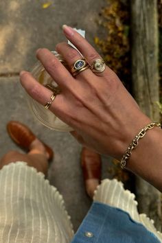 Signet Gold Rings, Hand With Lots Of Rings, Cool Girl Rings, Fall Jewelry Aesthetic, Queer Jewelry Aesthetic, Signet Ring Aesthetic, Cool Jewelry Aesthetic, Gold Rings Fine Jewelry, Rings On Hand Aesthetic