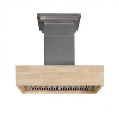 an image of a kitchen hood made out of wood and stainless steel with a ventilator