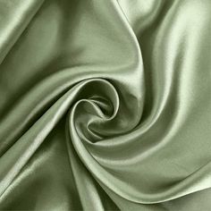 an image of a green satin fabric