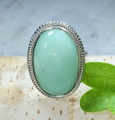 "Natural High Grade Natural Chrysoprase Handmade Oval .925 Sterling Silver Ring Size 7.25 8.9 Grams 1\" x 3/4\" FH10. Very durably ring crafted to last of a lifetime of enjoyment! This is a handpicked natural stone, the exact one shown in picture.  The sterling silver is .925 and stamped.  Each piece is hand made by artisans in my shop.  The quality of the stones and the silver workmanship is impressive.  Please look at other items in my store.  I sell ready made jewelry with hand crafted silver work, pendants with a sterling silver bails and beautiful unique cabochons for jewelry wire wrapping and weaving. You will pay exact amount on shipping plus $1 for supplies and labor. All items are shipped within a couple of days after payment and are shipped USPS first class or international first Chrysoprase Ring, Natural High, Made Jewelry, Ring Crafts, Silver Work, Ring Size 7, Ready Made, Wire Wrapped Jewelry, Statement Ring