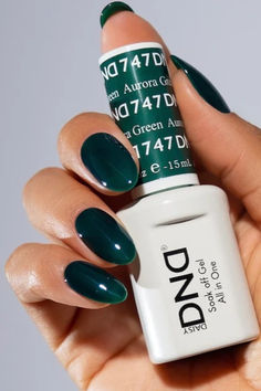 dark green gel on almond nails Gel Dark Green Nails, Dnd Winter Colors, Dark Green Gel X Nails, Green Nails With Gold Design, Dc Nail Polish Colors Fall, Dnd Dark Green Gel Polish, Fall Green Nail Colors, White And Dark Green Nails, Jelly Green Nails