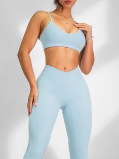 Description: This sports bra is designed to provide minimal yet supportive coverage, ensuring maximum comfort during your workouts. This sports bra offers the perfect balance of style and functionality. All of our sports bras are made out of high quality nylon and are well-padded to provide amazing comfort, coverage & support. Sizing: True to size Color: Sky Blue Fabric: Active Fit Seamless Sky Blue Fabric, 2025 Vision, Gym Clothes, Padded Bra, New Tops, Sports Bras, Blue Fabric, Gym Outfit