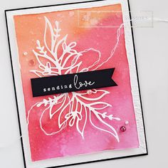 a close up of a card with a flower on it and the words sending love