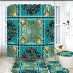 a bathroom with blue and gold decor on the shower curtain, rugs and bath mats