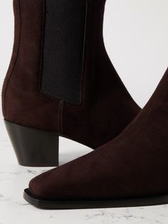 Find TOTÊME The City Suede Chelsea Boots on Editorialist. TOTEME's 'The City' boots fuse elements of classic Western and Chelsea styles. Made from supple suede, they have a squared-off pointed toe and are set on a stacked Cuban heel. The elasticated side panels will ensure you can pull them on with ease. City Boots, Brown Chelsea Boots, Suede Chelsea Boots, Cuban Heels, Side Panels, Brown Boots, Shoes Boots, Chelsea Boots, The City