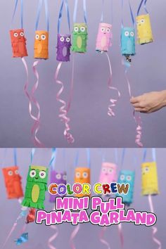 colorful crepe mini - cut pinata garlands hanging from strings