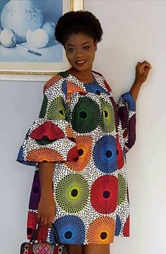 Ankara dress is a type of dress that is made from Ankara fabric, which is a colorful cotton fabric with various patterns and designs. Ankara fabric is also known as African wax print, Dutch wax, or African print1. Ankara dress is popular among African women, especially in Nigeria, Ghana, and other West African countries. Ankara dress can be worn for different occasions, such as weddings, parties, casual outings, and cultural events. Ankara dress can be styled in various ways, such as short dress Multicolor Cotton Maxi Dress For Vacation, Multicolor Print Cotton Dress For Vacation, Multicolor Vibrant Print Dress, Multicolor Bold Print Midi Dress, Multicolor Floral Print Midi Mini Dress, Vibrant Multicolor Print Knee-length Dress, Colorful Cotton Beach Dress, Multicolor Vibrant Print Knee-length Dress, Multicolor Midi Dress With Vibrant Print