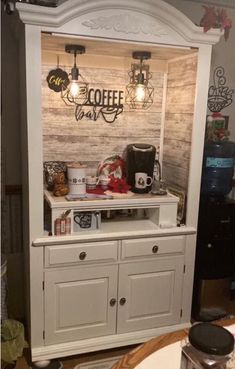 a coffee bar built into the side of a cabinet